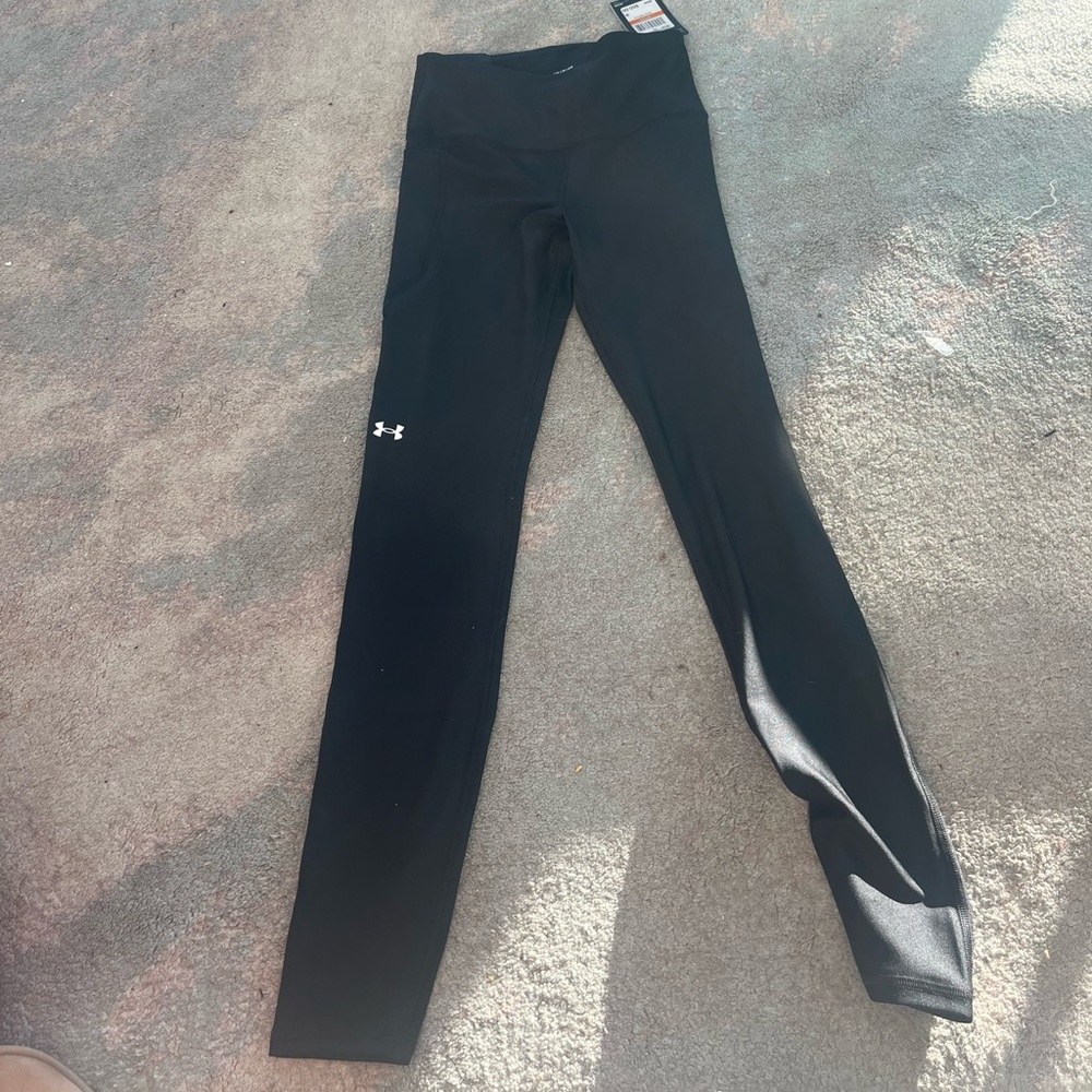 New with Tags Under Armour women running leggings in size small